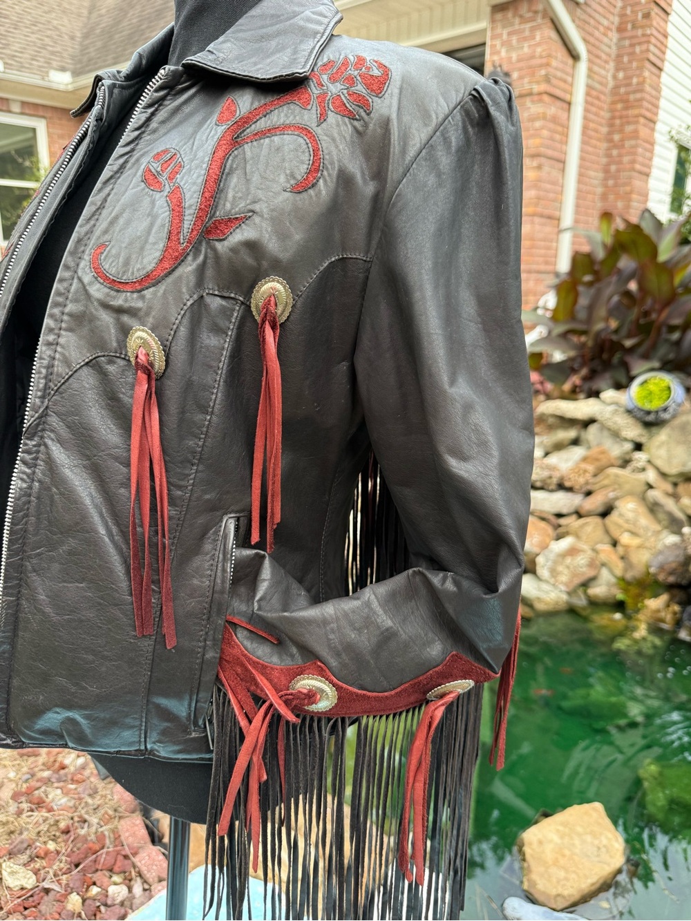 Black Leather Bomber Jacket with Red Fringe & Embroidered Accents - Picture 5 of 11